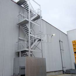 Roof access staircase with security door and cage Outdoor staircase with security door and cage for roof access